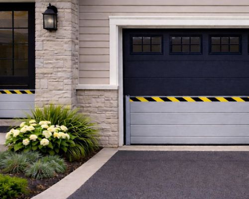 Flood barrier system for garage doors and large building openings