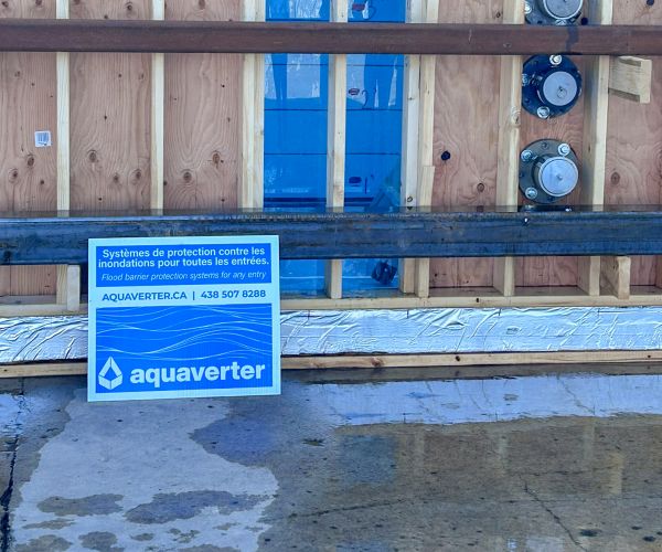 Aquaverter flood barrier undergoing structural and impact resistance testing